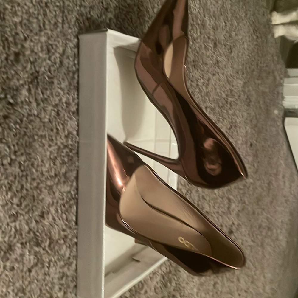 Worn once for photo shoot , copper heels